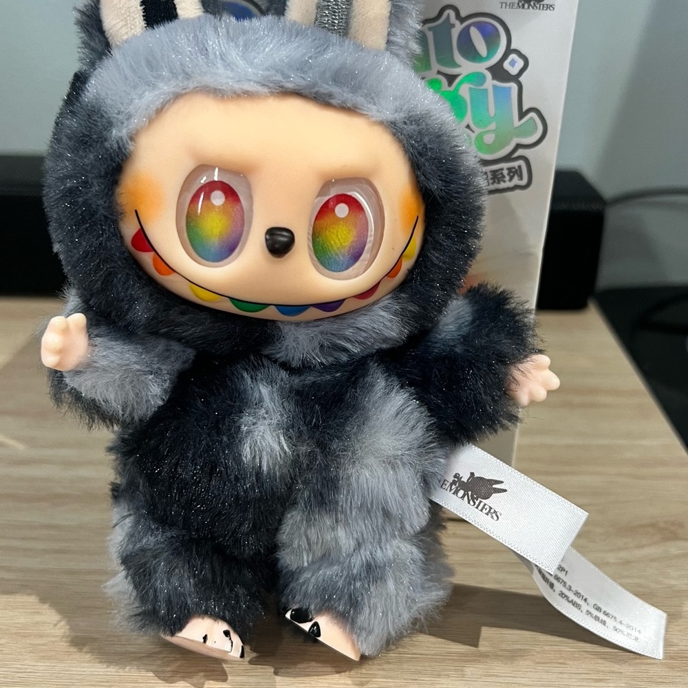 Gray and Black Plush Monster Toy